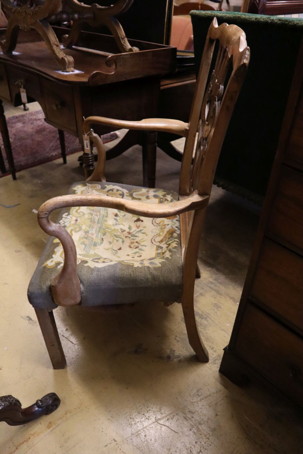 A George III mahogany armchair with shepherds crook arms